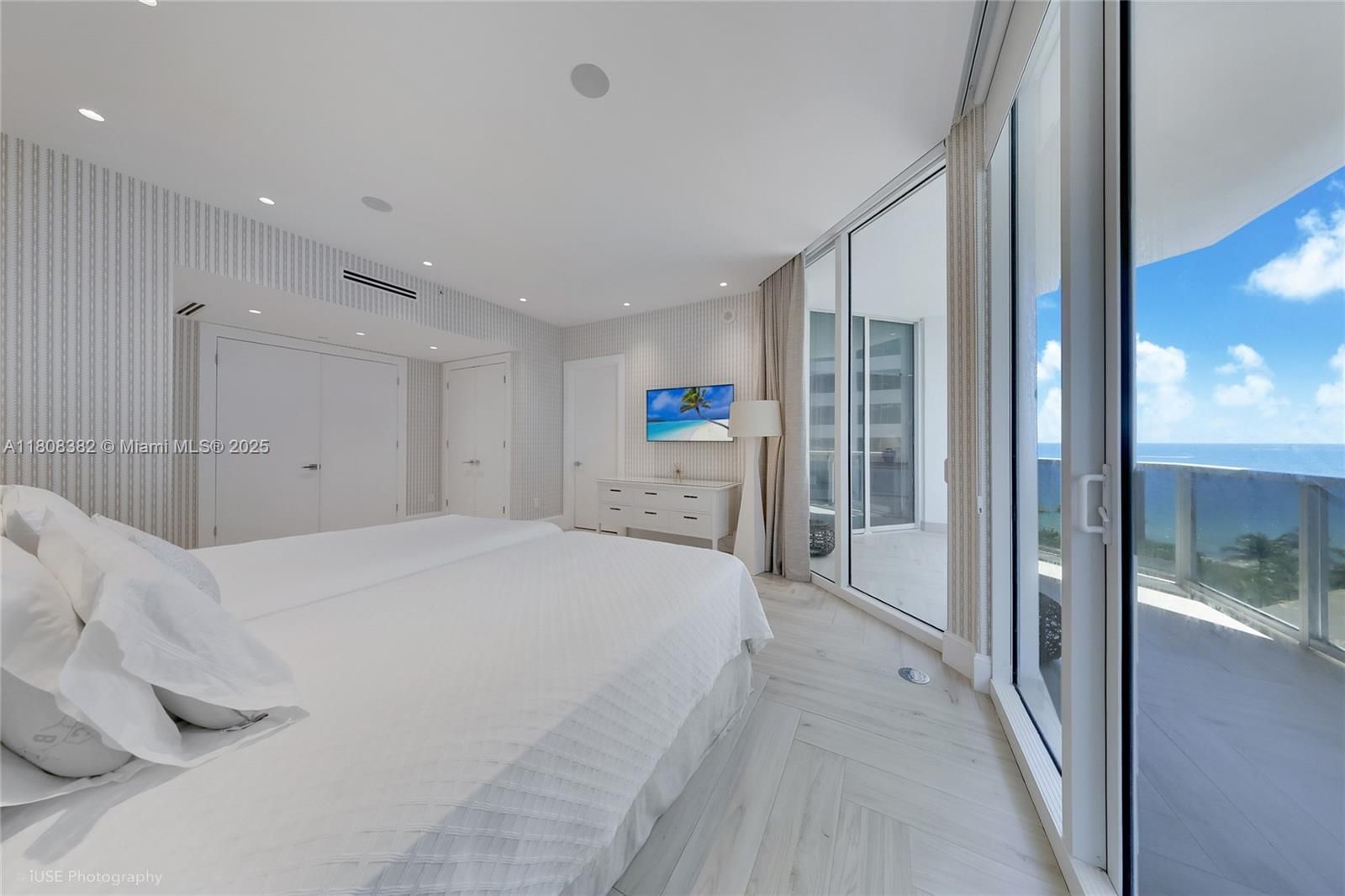 3rd Bedroom with 2 closets, looking at the balcony, the ocean